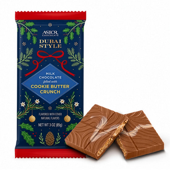 Milk chocolate bar with cookie butter crunch, shown with blue foil package and pieces